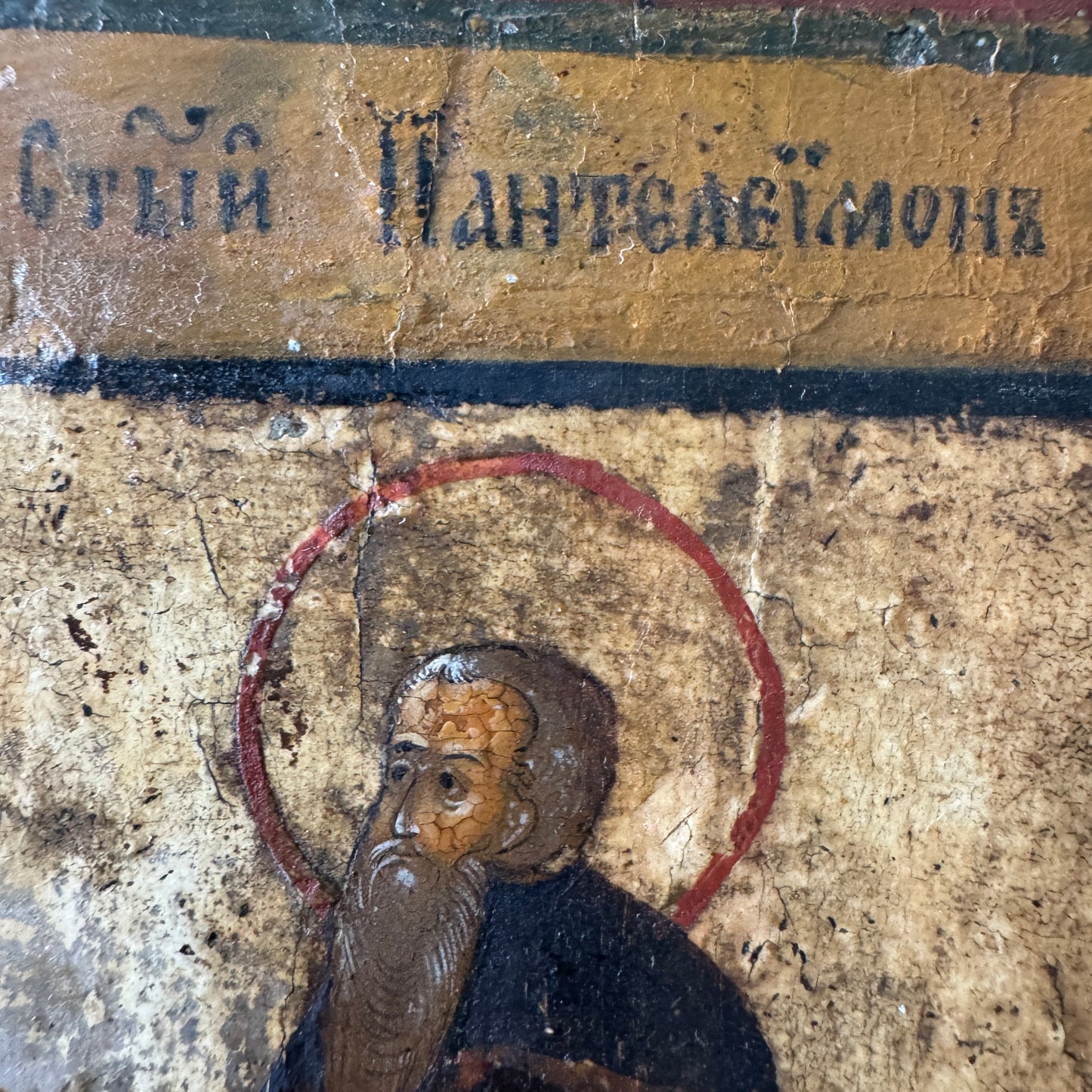 Saint Panteleimon in Prayer Before the Church. 19th-century Icon on Wood.